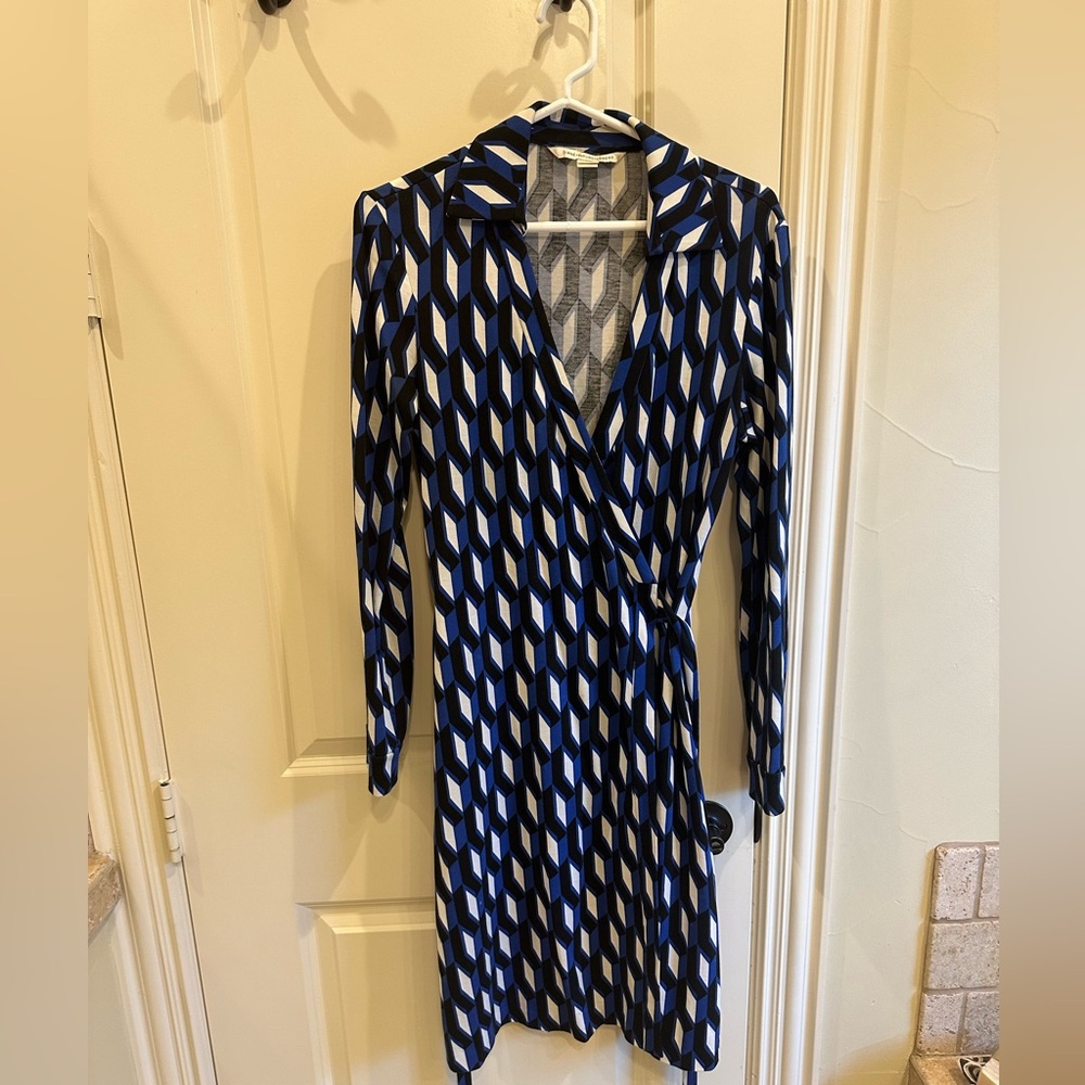 Classic Diane Von Furstenberg Wrap Dress. Royal Blue, Black and Ivory print.